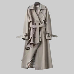Women’s belted double-breasted long trench coat by Christine Brewer, shown in Jakarta with classic tailored design.