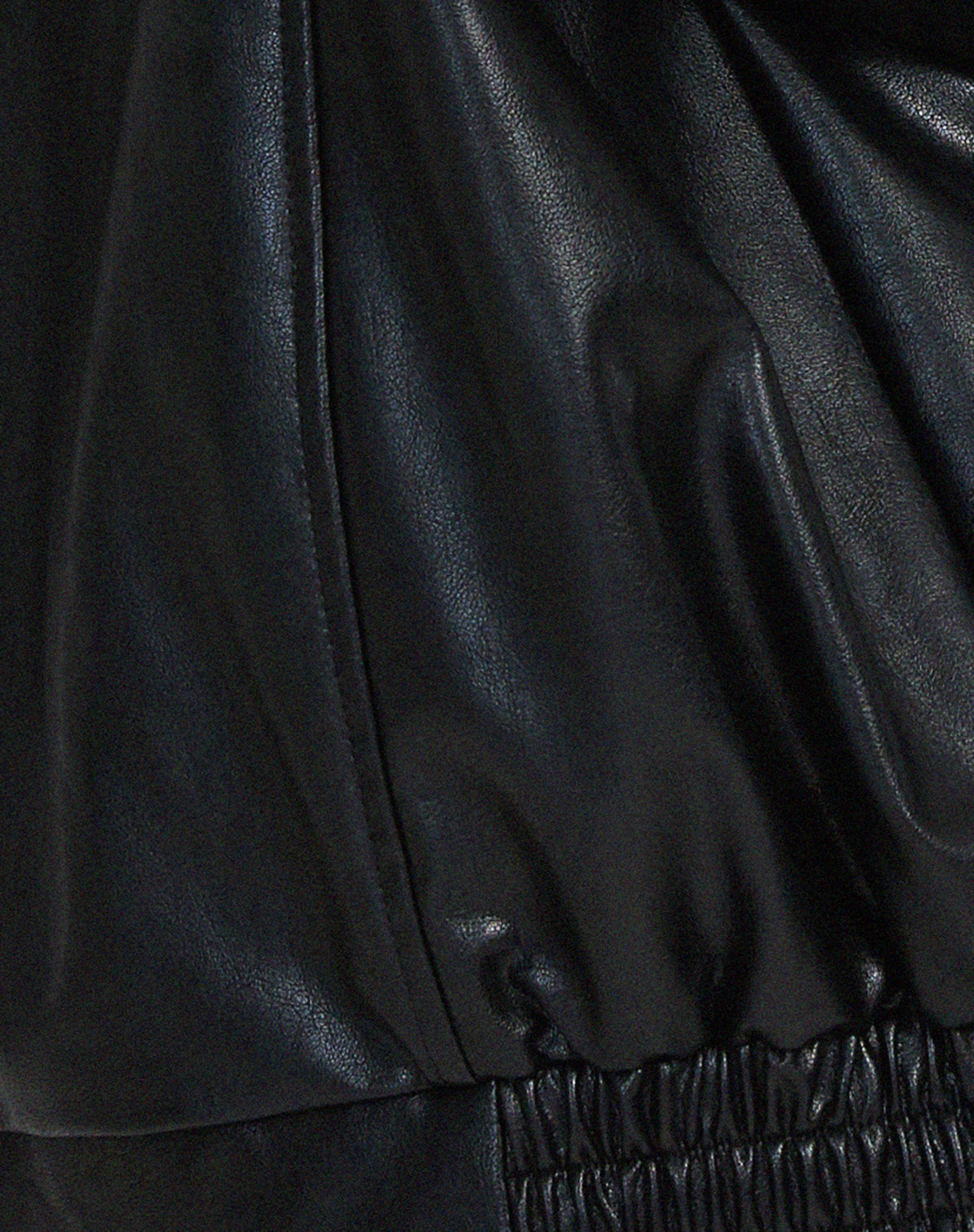 Josephine oversized faux leather bomber jacket for women by Christine Brewer, featuring a stylish, sleek design and classic bomber silhouette.