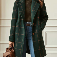 Women's retro plaid tweed coat with lapel collar by Christine Brewer, shown hanging on a wooden hanger.