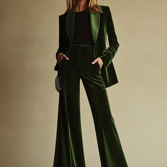 Emerald green velvet two-piece suit set for women by Christine Brewer, featuring stylish loose pants and a matching top.