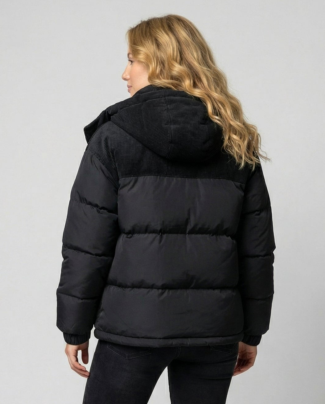 Warm insulated Chloe Cosy Puffer Jacket for women by Christine Brewer, featuring a stylish, quilted design and cozy collar.