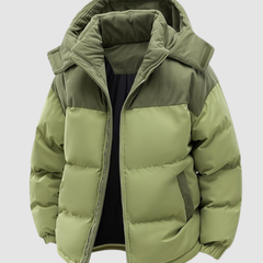 Green Chloe Cosy Puffer Jacket for women, insulated and warm, designed by Christine Brewer, with a quilted, padded appearance.