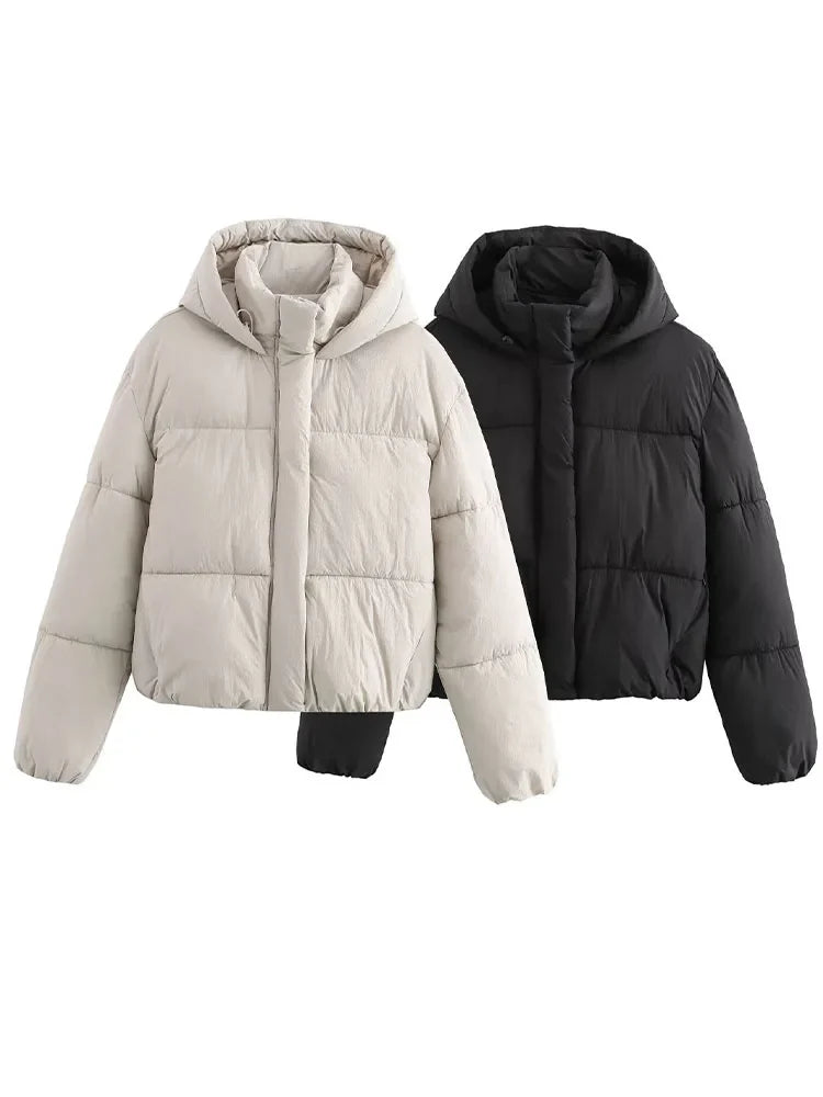 Christine Brewer Grace hooded puffer jacket for women, showcasing a warm, quilted winter jacket with a hood and stylish design.