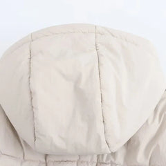 Christine Brewer Grace hooded puffer jacket for women, featuring a warm quilted design and adjustable hood, ideal for cold weather.
