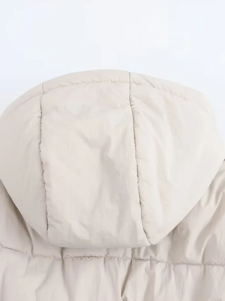 Christine Brewer Grace hooded puffer jacket for women, featuring a warm quilted design and adjustable hood, ideal for cold weather.