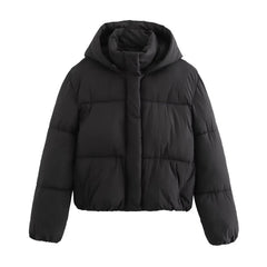 Black Christene Brewer Grace hooded puffer jacket for women, showcasing its quilted design and cozy hood.