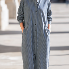 Elegant Christine Brewer midi dress for women with a flowing design and stylish neckline, perfect for casual or formal occasions.