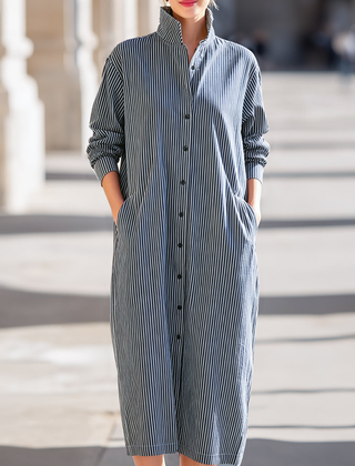 Elegant Christine Brewer midi dress for women with a flowing design and stylish neckline, perfect for casual or formal occasions.