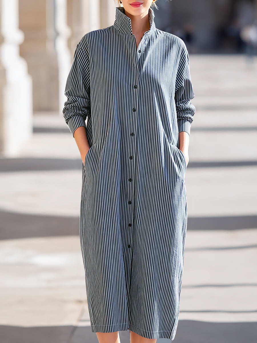 Elegant Christine Brewer midi dress for women with a flowing design and stylish neckline, perfect for casual or formal occasions.