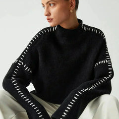 Black Valentina oversized wool sweater for women by Christine Brewer, featuring ribbed knit and mock neck design.