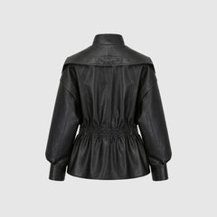 Man wearing the Lucy faux leather jacket for women by Christine Brewer, featuring a sleek design and cinched waist.