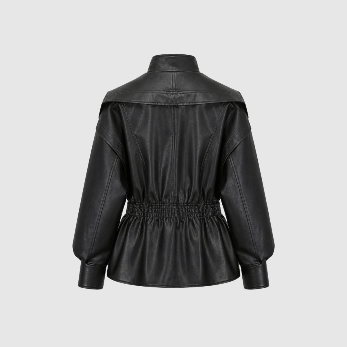Man wearing the Lucy faux leather jacket for women by Christine Brewer, featuring a sleek design and cinched waist.