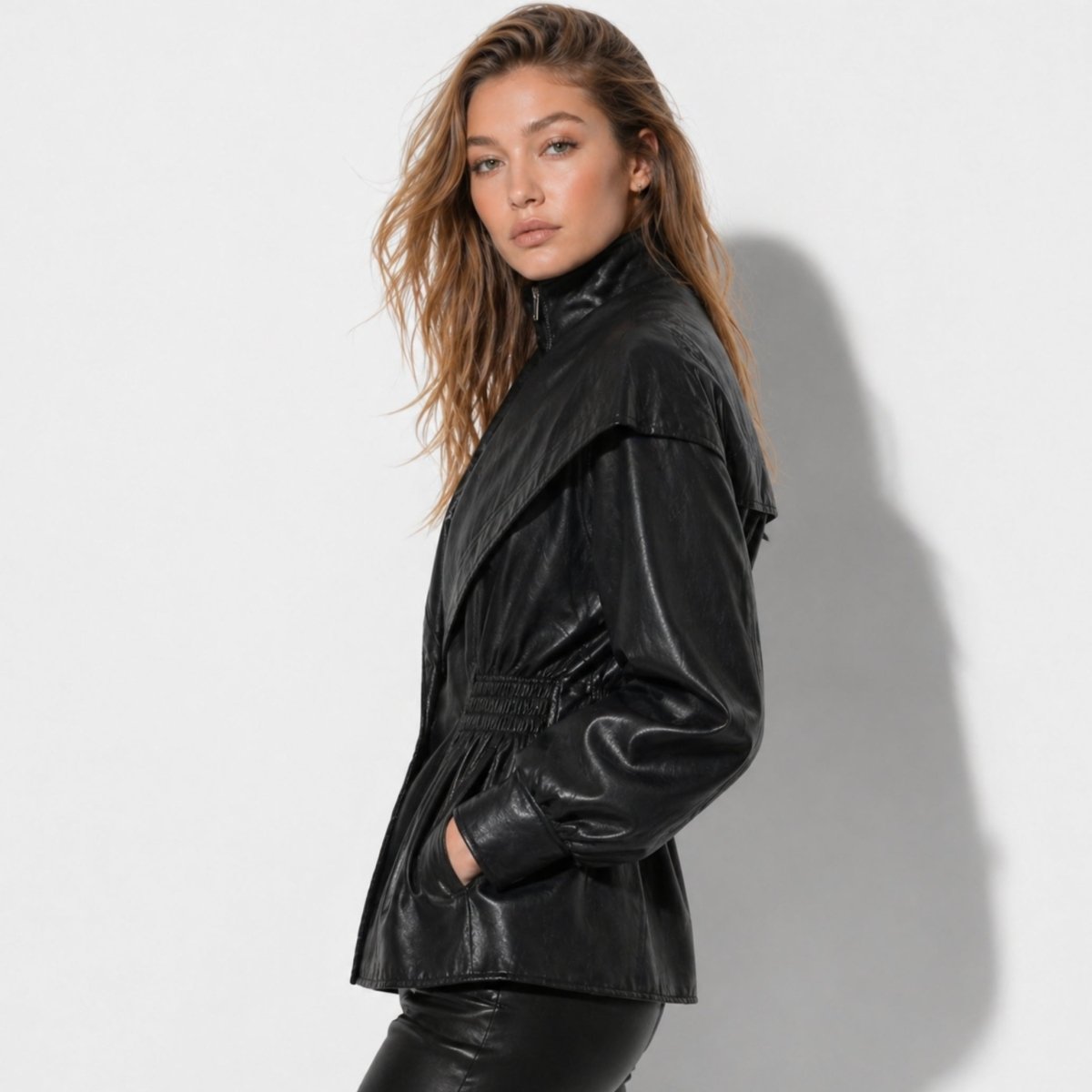 Manon cinched waist faux leather jacket for women by Christine Brewer, featuring sleek design and stylish details.