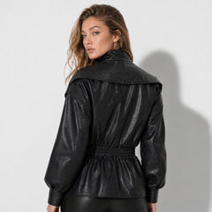 Manon cinched waist faux leather jacket for women by Christine Brewer, showcasing sleek design and stylish fit.