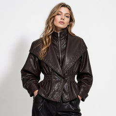 Dark brown faux leather jacket for women by Christine Brewer, featuring a sleek, cinched waist design.