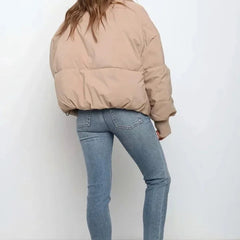 Emily women's stand collar puffer jacket by Christine Brewer, featuring a cozy padded design and stylish silhouette.