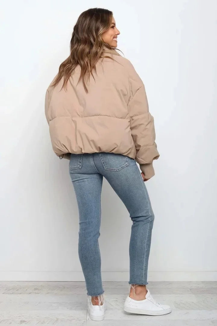 Emily women's stand collar puffer jacket by Christine Brewer, featuring a cozy padded design and stylish silhouette.