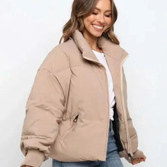 Emily stand collar puffer jacket for women by Christine Brewer, featuring quilted design and warm, cozy outerwear style.