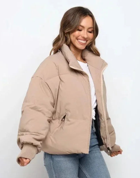 Emily stand collar puffer jacket for women by Christine Brewer, featuring quilted design and warm, cozy outerwear style.