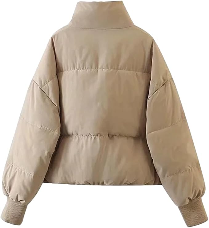 Emily stand collar puffer jacket for women by Christine Brewer, featuring a stylish quilted design and cozy winter insulation.