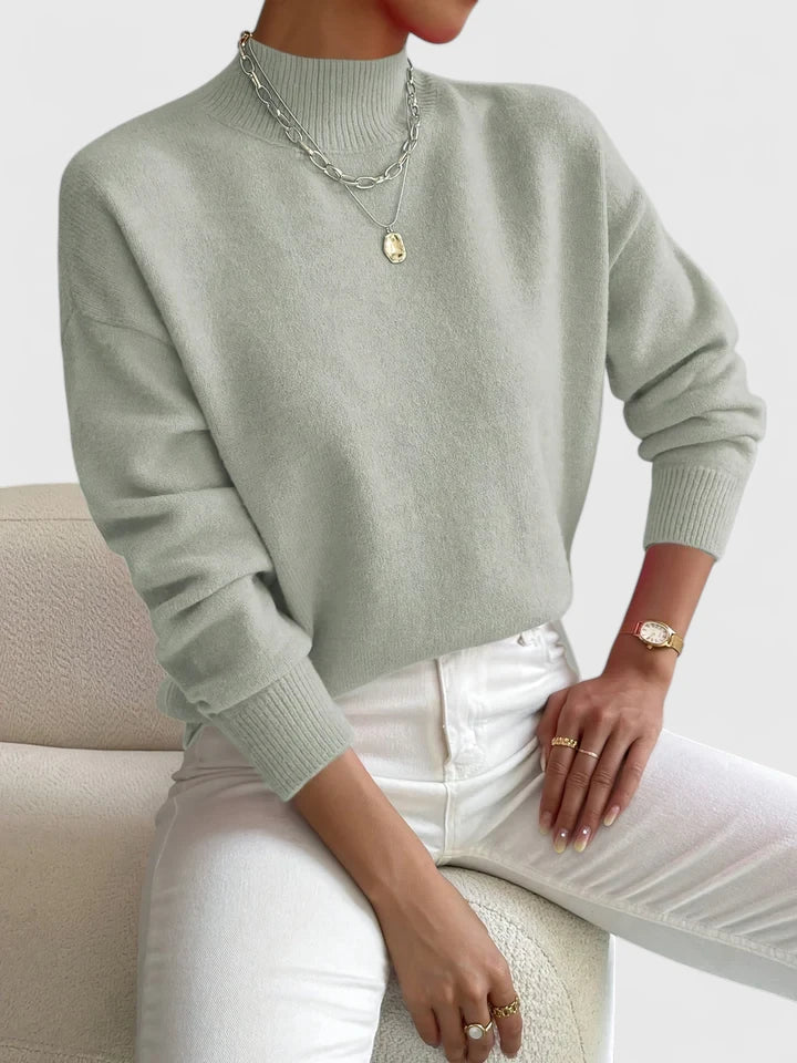 Comfortable cozy turtleneck sweater by Christine Brewer, featuring a soft knit fabric and versatile style in a relaxed fit.