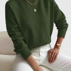 Cozy beige turtleneck sweater by Christine Brewer, featuring a versatile and comfortable design, ideal for casual wear.
