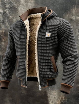 Men's quilted fleece-lined hooded zip-up thermal jacket by Christine Brewer, showing the fleece lining and quilted exterior.