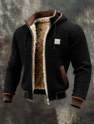 Men's quilted fleece-lined hooded zip-up thermal jacket by Christine Brewer, showing the jacket's quilted exterior and fleece-lined interior.
