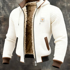 Men's quilted fleece-lined hooded zip-up thermal jacket by Christine Brewer, shown in a close-up of the jacket's front.