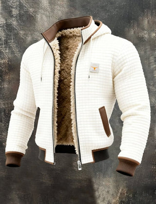 Men's quilted fleece-lined hooded zip-up thermal jacket by Christine Brewer, shown in a close-up of the jacket's front.