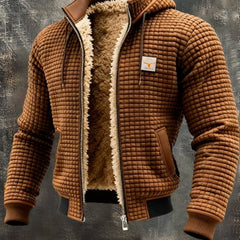 Men's quilted fleece-lined hooded zip-up thermal jacket by Christine Brewer, shown in a close-up of the warm, insulated coat.