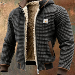 Men's quilted fleece-lined hooded zip-up thermal jacket by Christine Brewer featuring a warm, padded design with a front zipper and hood.