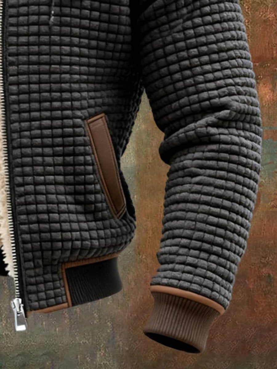 Men's quilted fleece-lined hooded zip-up thermal coat by Christine Brewer, shown in a cozy, insulated design with a front zipper and hood.
