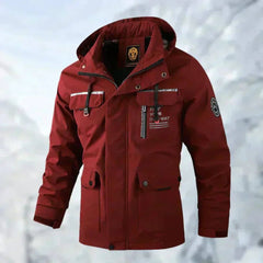 Men's quilted waterproof hooded outdoor coat by Christine Brewer, windproof jacket with quilted insulation and adjustable hood.