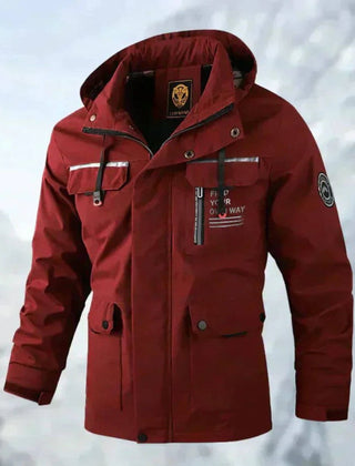 Men's quilted waterproof hooded outdoor coat by Christine Brewer, windproof jacket with quilted insulation and adjustable hood.