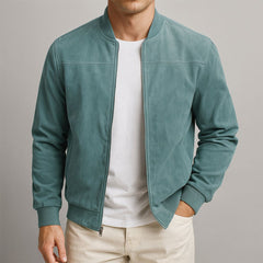 Men's slim-fit quilted suede bomber jacket by Christine Brewer featuring a classic design with a quilted pattern and ribbed cuffs.