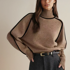 Christine Brewer Eva tailored chic loose fit roll neck sweater, soft knit clothing with a stylish, relaxed fit in neutral tones.