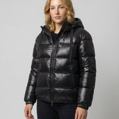 Black Abigail quilted puffer jacket for women by Christine Brewer, showcasing its quilted design and cozy fit.