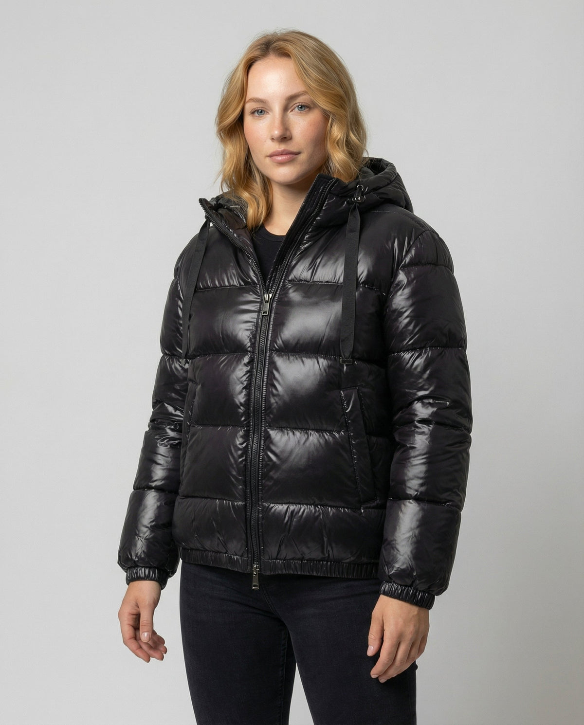 Black Abigail quilted puffer jacket for women by Christine Brewer, showcasing its quilted design and cozy fit.