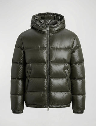Green Abigail quilted puffer jacket for women by Christine Brewer, featuring a stylish quilted design and cozy insulation.