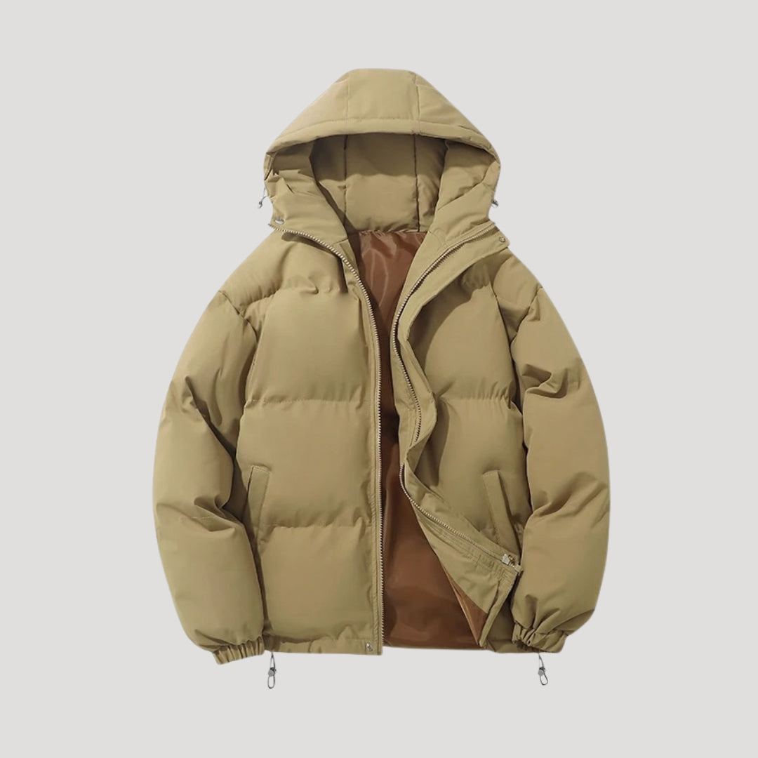Brown Evelyn hooded puffer jacket for women by Christine Brewer, showcasing the insulated quilted design and cozy hood.
