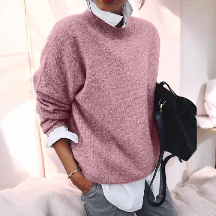 Pink knit sweater for women by Christine Brewer, featuring a cozy, soft fabric and a stylish, fitted design.