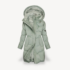 Green Mia long hooded puffer jacket for women by Christine Brewer, featuring a stylish, insulated winter jacket with a hood.