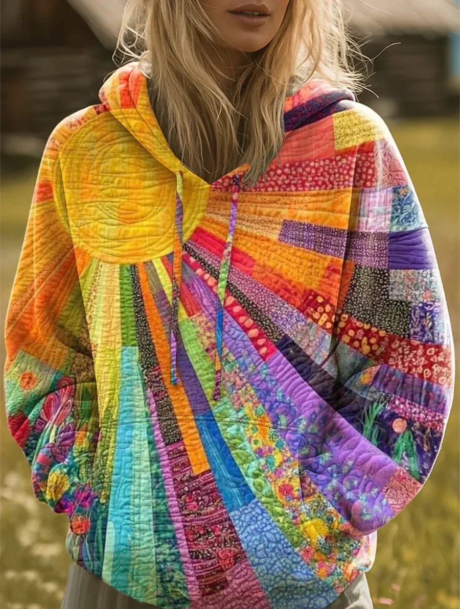 Multicolor bohemian patchwork hoodie for women by Christine Brewer featuring Daisy design, made of soft, vibrant fabric.