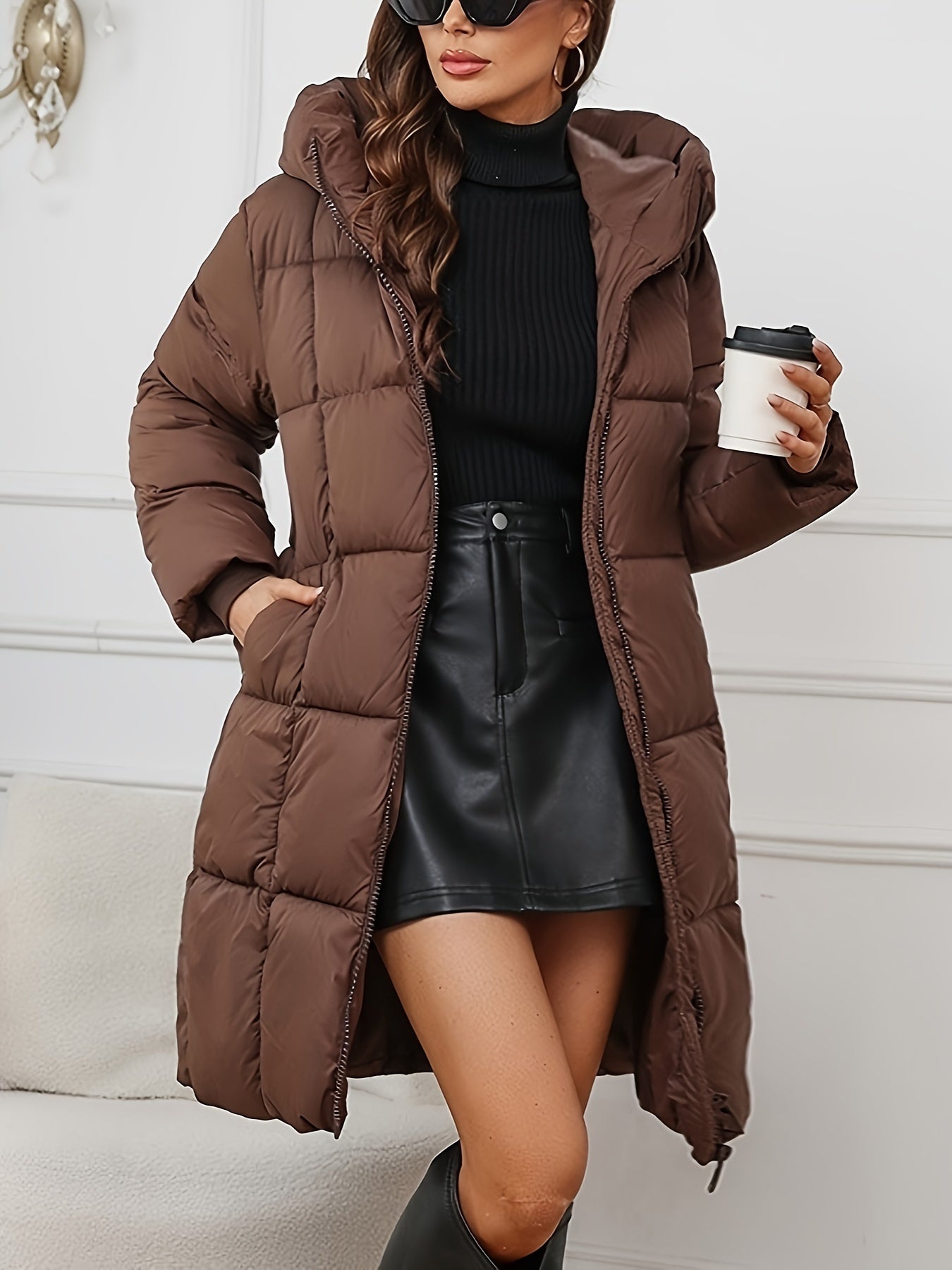 Rosalie mid-length hooded puffer jacket for women by Christine Brewer, featuring a quilted design and cozy hood for winter warmth.