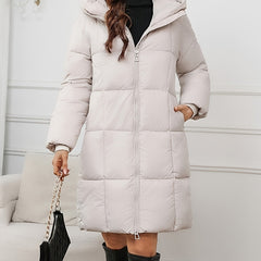Beige Harper hooded puffer jacket for women by Christine Brewer, mid-length design, warm and stylish outerwear.