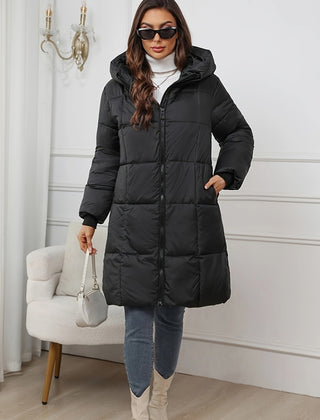 Black Harper hooded puffer jacket for women by Christine Brewer, mid-length design with a cozy hood and quilted insulation.