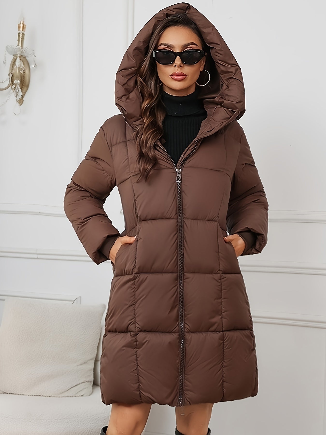 Brown Harper hooded puffer jacket for women by Christine Brewer, mid-length with a warm, padded design and hood.