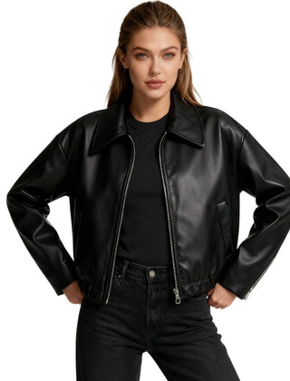 Black cropped faux leather jacket for women from Christine Brewer's Hannah collection, styled with a modern, edgy look.