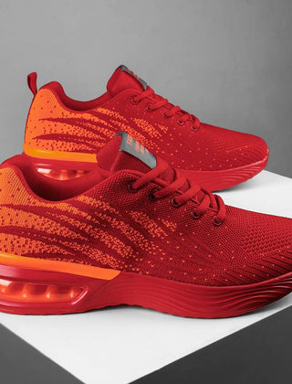Christine Brewer women's running shoes with breathable knit upper and air cushion sole, designed for comfortable running.